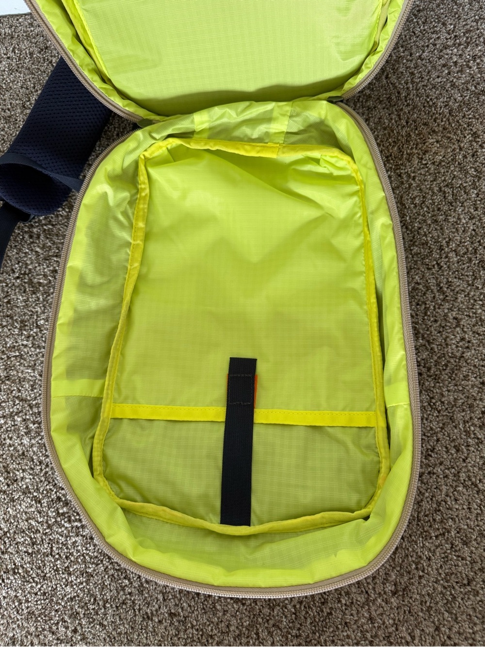 cotopaxi Black Sling Backpack with Blue Piping and Red Zip Pull - Picture 8 of 10